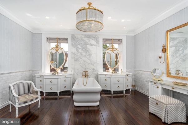 Bathroom, Free Standing Baths, Interior, Marble Walls, Recessed Lighting, Wood Texture Flooring