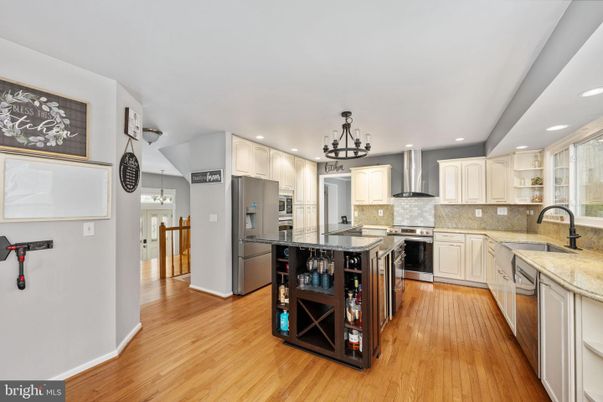 Chandelier, Interior, Kitchen, Recessed Lighting, Stainless Steel Appliances, Wood Texture Flooring