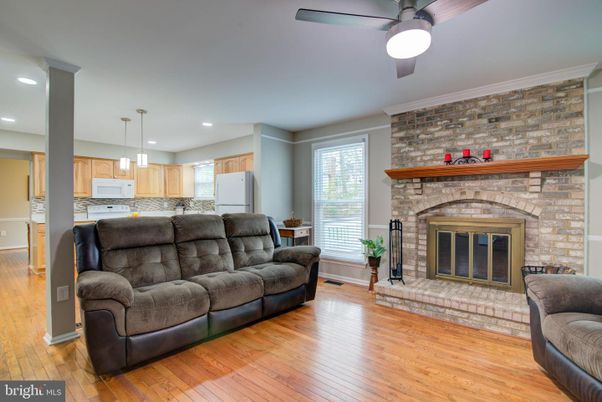 Fireplace, Interior, Kitchen, Living room, Pendant Lights, Recessed Lighting, Stone Walls, Wood Texture Flooring