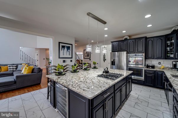 Interior, Kitchen, Living room, Marble, Pendant Lights, Recessed Lighting, Stainless Steel Appliances
