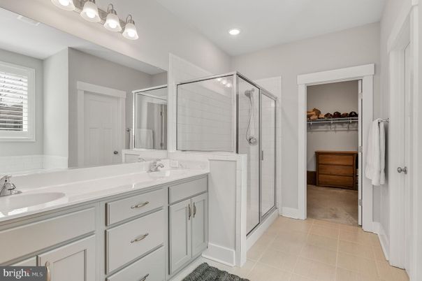 Bathroom, Dual Sink Vanities, Glass Shower, Interior, Recessed Lighting, Walk-in Closets