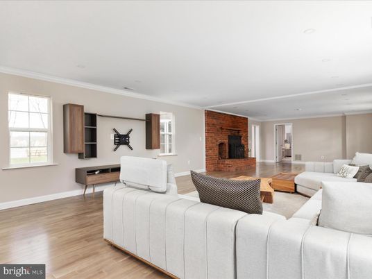 Fireplace, Interior, Living room, Recessed Lighting, Stone Walls, Wood Texture Flooring