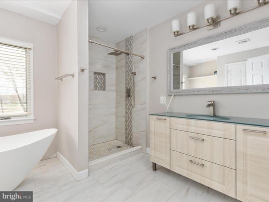 Bathroom, Free Standing Baths, Glass Shower, Interior, Marble, Marble Walls, Recessed Lighting