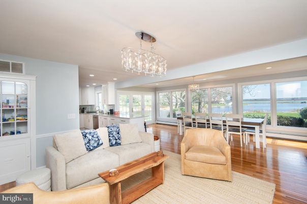 Chandelier, Dining room, Interior, Kitchen, Living room, Pendant Lights, Recessed Lighting, Water, Wood Texture Flooring