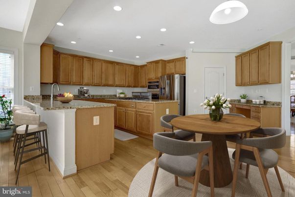 Dining room, Interior, Kitchen, Recessed Lighting, Stainless Steel Appliances, Wood Texture Flooring
