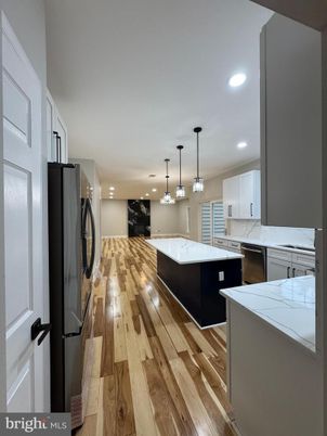 Interior, Kitchen, Pendant Lights, Recessed Lighting, Washer, Wood Texture Flooring
