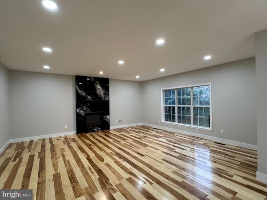 Empty room, Fireplace, Interior, Recessed Lighting, Wood Texture Flooring