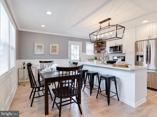 Dining room, Interior, Kitchen, Pendant Lights, Recessed Lighting, Stainless Steel Appliances, Wood Texture Flooring