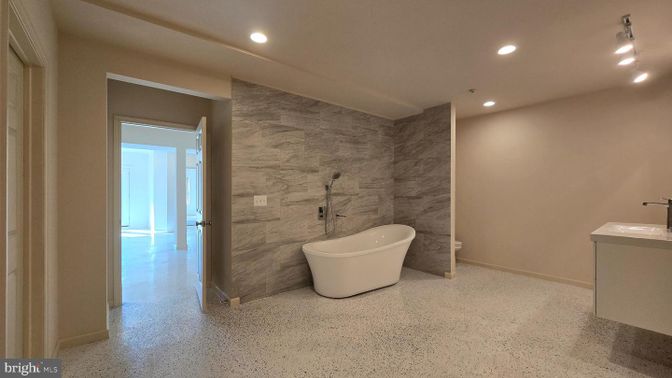 Bathroom, Dual Sink Vanities, Free Standing Baths, Interior, Marble Walls, Recessed Lighting