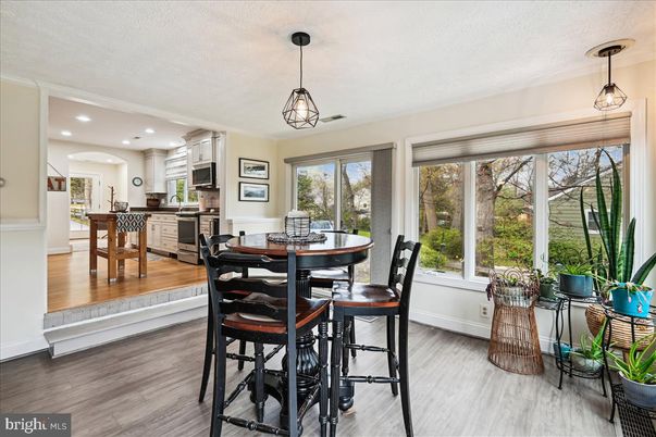 Dining room, Interior, Kitchen, Pendant Lights, Recessed Lighting, Stainless Steel Appliances, Wood Texture Flooring