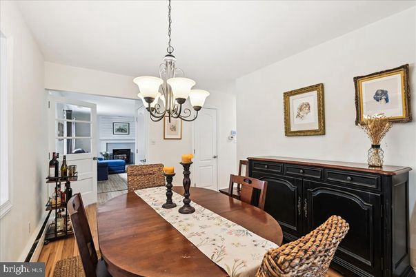 Chandelier, Dining room, Fireplace, Interior, Wood Texture Flooring