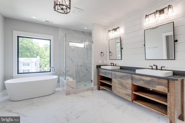 Bathroom, Dual Sink Vanities, Free Standing Baths, Glass Shower, Interior, Marble, Marble Walls, Recessed Lighting