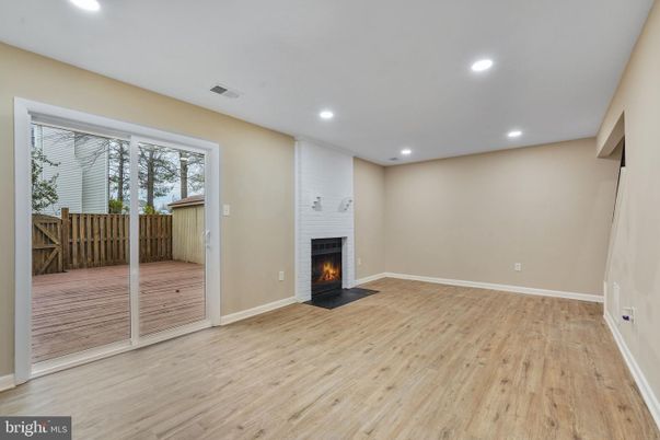 Empty room, Fireplace, Interior, Recessed Lighting, Wood Texture Flooring