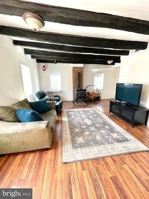 Fireplace, Interior, Living room, Stone Walls, Wooden Beams, Wood Texture Flooring
