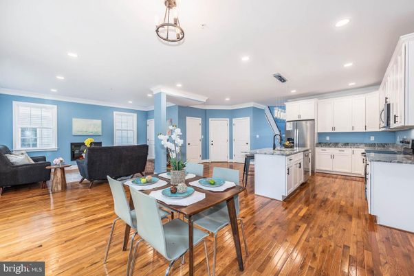 Dining room, Interior, Kitchen, Living room, Pendant Lights, Recessed Lighting, Stainless Steel Appliances, Wood Texture Flooring