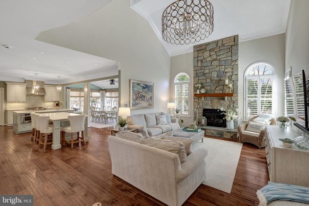 Dining room, Fireplace, Interior, Kitchen, Living room, Pendant Lights, Recessed Lighting, Stainless Steel Appliances, Stone Walls, Wood Texture Flooring