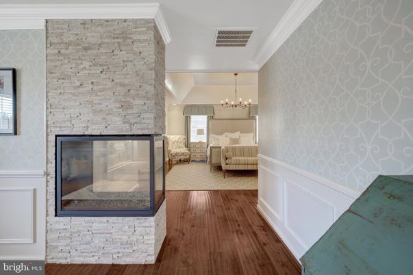 Chandelier, Fireplace, Interior, Stone Walls, Wood Texture Flooring