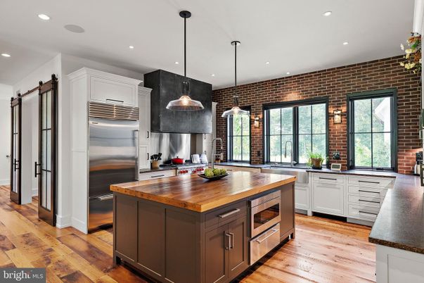 Interior, Kitchen, Pendant Lights, Recessed Lighting, Stainless Steel Appliances, Stone Walls, Wood Texture Flooring