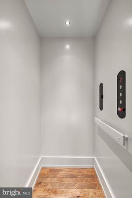 Elevator, Interior, Recessed Lighting, Wood Texture Flooring