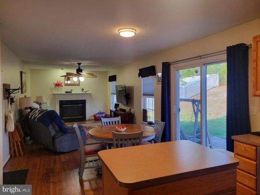 Dining room, Fireplace, Interior, Living room, Wood Texture Flooring