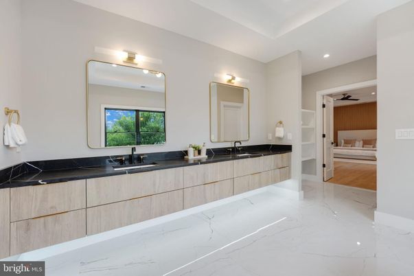 Bathroom, Dual Sink Vanities, Interior, Marble, Recessed Lighting, Wood Texture Flooring