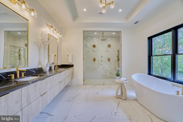 Bathroom, Dual Sink Vanities, Free Standing Baths, Glass Shower, Interior, Marble, Marble Walls, Recessed Lighting
