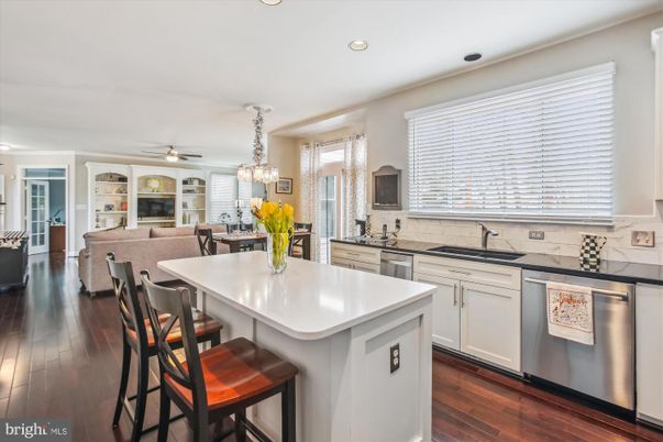 Chandelier, Dining room, Interior, Kitchen, Living room, Recessed Lighting, Stainless Steel Appliances, Wood Texture Flooring