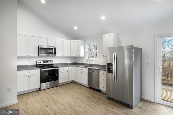 Interior, Kitchen, Recessed Lighting, Stainless Steel Appliances, Wood Texture Flooring