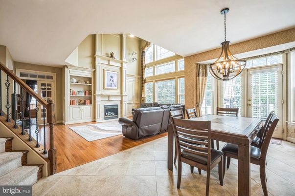 Chandelier, Dining room, Fireplace, Interior, Living room, Pendant Lights, Wood Texture Flooring