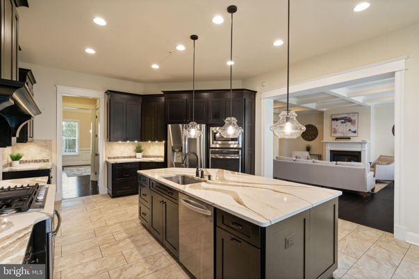 Fireplace, Interior, Kitchen, Living room, Pendant Lights, Recessed Lighting, Stainless Steel Appliances