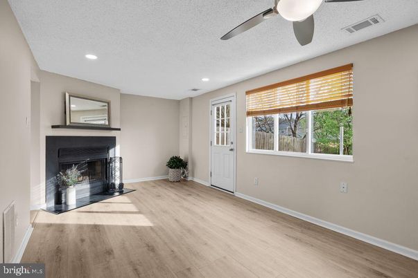 Empty room, Fireplace, Interior, Recessed Lighting, Wood Texture Flooring