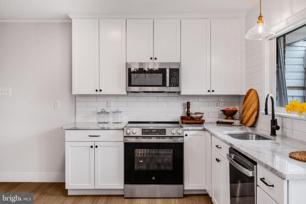 Interior, Kitchen, Pendant Lights, Stainless Steel Appliances, Wood Texture Flooring