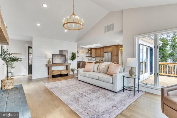 Chandelier, Interior, Kitchen, Living room, Pendant Lights, Recessed Lighting, Stainless Steel Appliances, Wood Texture Flooring