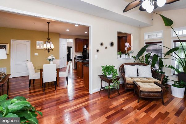 Chandelier, Dining room, Interior, Kitchen, Pendant Lights, Recessed Lighting, Stainless Steel Appliances, Wood Texture Flooring