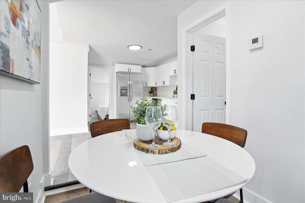 Dining room, Interior, Kitchen, Recessed Lighting, Stainless Steel Appliances, Wood Texture Flooring