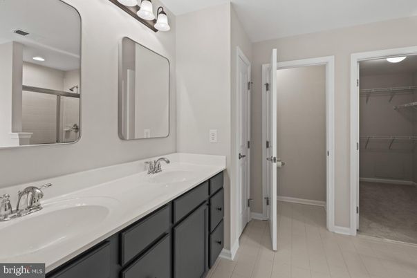 Bathroom, Dual Sink Vanities, Interior, Recessed Lighting, Walk-in Closets
