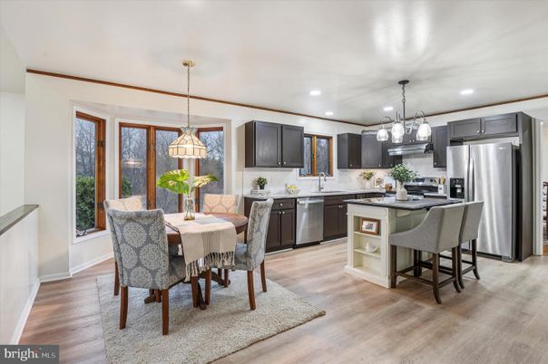 Dining room, Interior, Kitchen, Pendant Lights, Recessed Lighting, Stainless Steel Appliances, Wood Texture Flooring