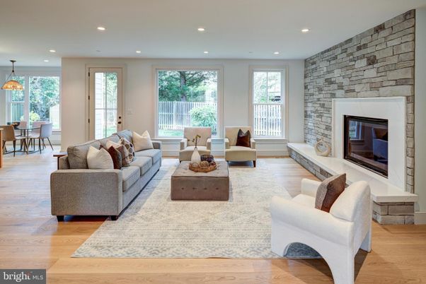 Dining room, Fireplace, Interior, Living room, Pendant Lights, Recessed Lighting, Stone Walls, Wood Texture Flooring
