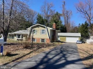 Attached, Backyard, Exterior, Facade, Brick Facade, None
