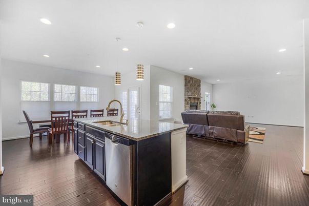 Dining room, Fireplace, Interior, Kitchen, Living room, Pendant Lights, Recessed Lighting, Wood Texture Flooring