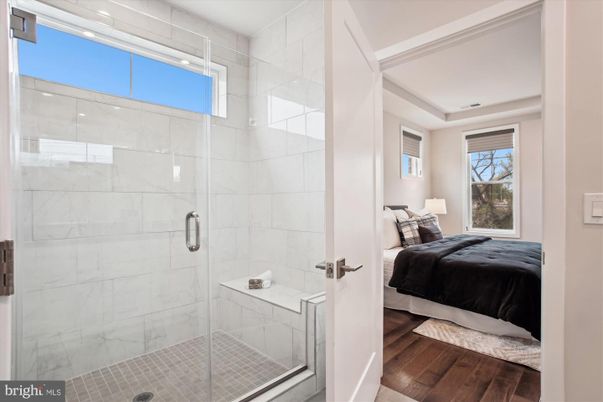Bathroom, Bedroom, Glass Shower, Interior, Marble Walls, Recessed Lighting, Wood Texture Flooring