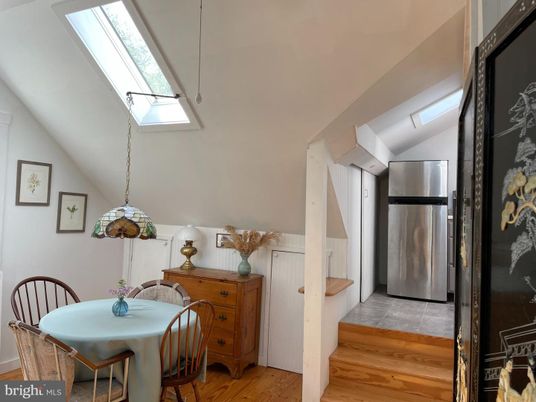 Dining room, Interior, Kitchen, Pendant Lights, Stainless Steel Appliances, Wood Texture Flooring