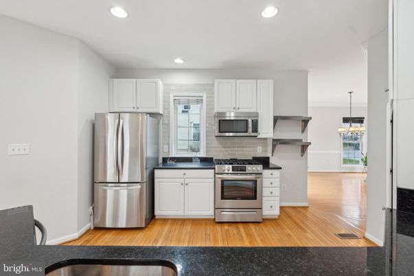 Chandelier, Interior, Kitchen, Pendant Lights, Recessed Lighting, Stainless Steel Appliances, Wood Texture Flooring