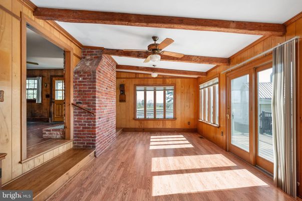 Empty room, Fireplace, Interior, Stone Walls, Wooden Beams, Wood Texture Flooring, Wooden Walls