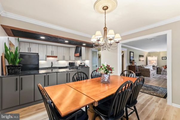Chandelier, Dining room, Interior, Kitchen, Living room, Recessed Lighting, Stainless Steel Appliances, Wood Texture Flooring