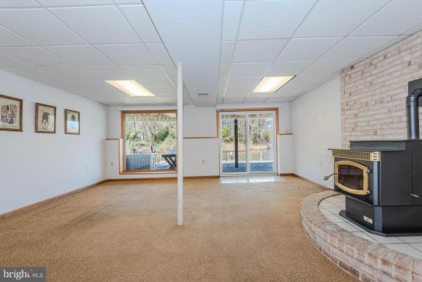 Empty room, Fireplace, Interior, Recessed Lighting, Stone Walls