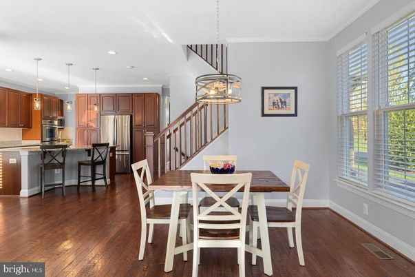 Dining room, Interior, Kitchen, Pendant Lights, Recessed Lighting, Stainless Steel Appliances, Wood Texture Flooring
