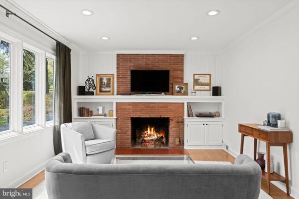 Fireplace, Interior, Living room, Recessed Lighting, Stone Walls, Wood Texture Flooring