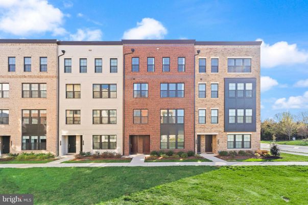 Backyard, Exterior, Facade, Brick Facade, Condo Building