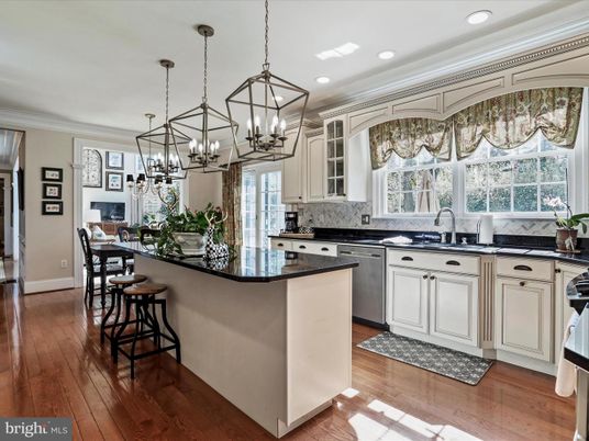 Chandelier, Dining room, Interior, Kitchen, Pendant Lights, Recessed Lighting, Stainless Steel Appliances, Wood Texture Flooring